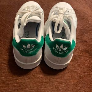 Adidas Stan Smiths. White and green. Men’s size 5. Women’s size 7.